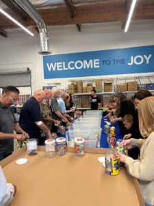 Members of the Murphy Family Foundation assemble JoyJars